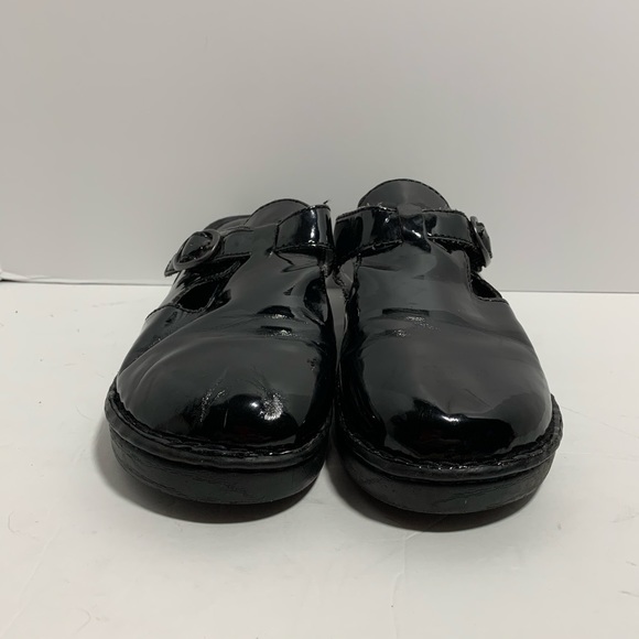 boc black patent leather clogs